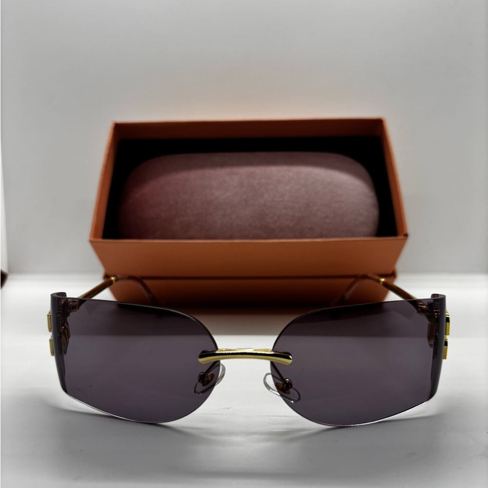 Rimless Sunglasses with Gold Accents - Purple Lenses